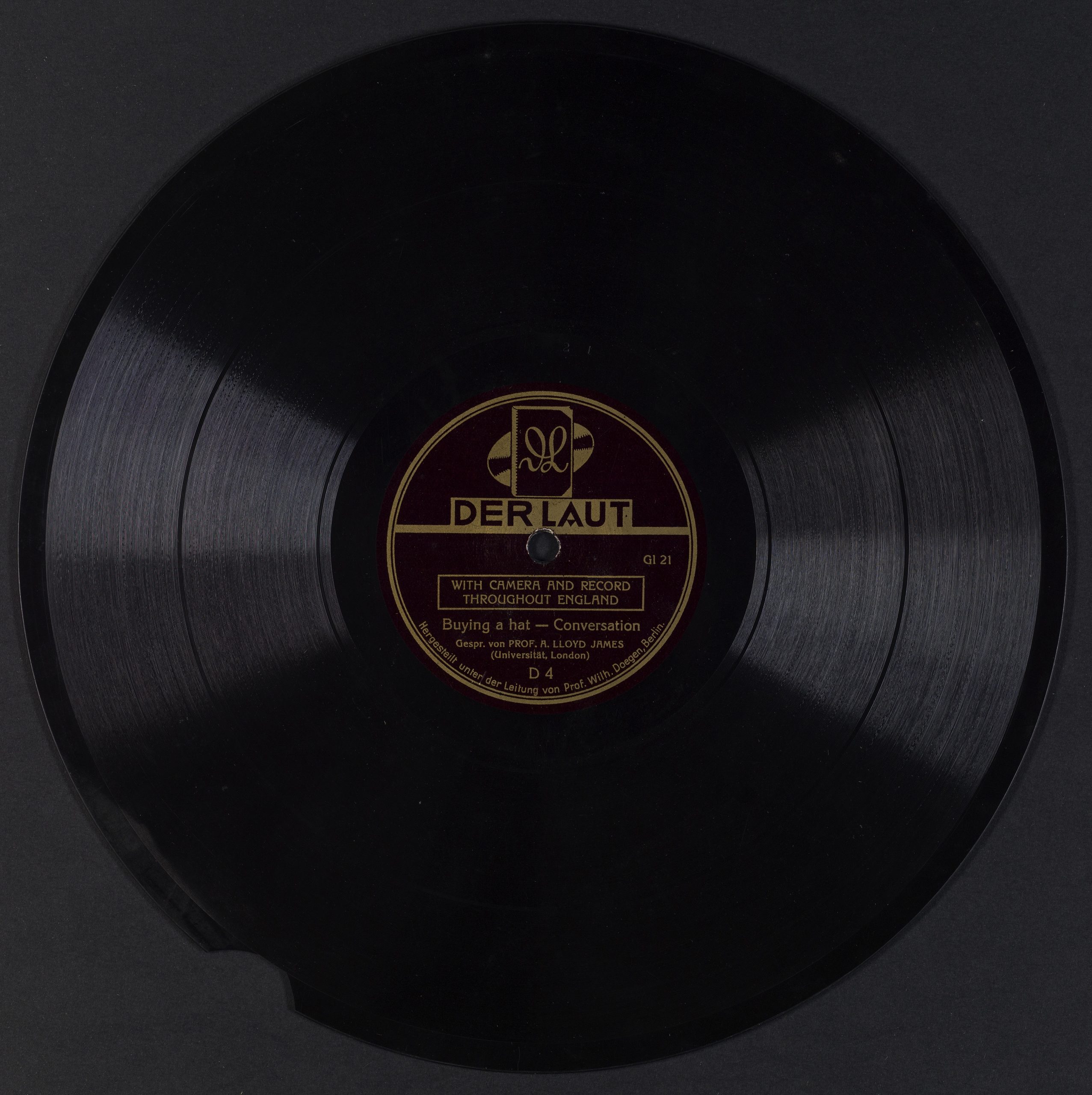 DHM Recording T 98/12 – With Camera and Record, Disc 4, Side B: “Buying a Hat – Conversation”